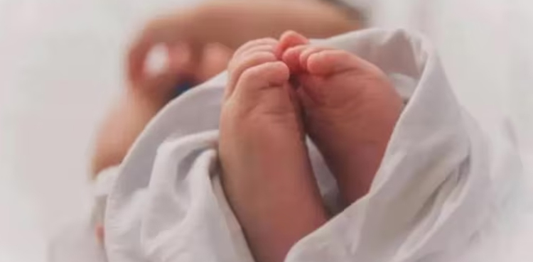 Doctor detained, branding hot iron rod, two-month-old