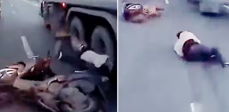 Viral Video, Biker nearly crushed, two trailers