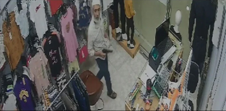 CCTV footage, robbery, garments shop, Karachi