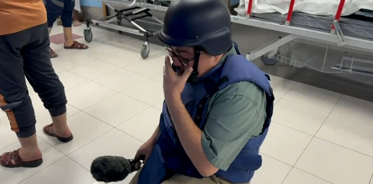 BBC reporter, breaks into tears, Gaza hospital, reporting, Israeli bombardment