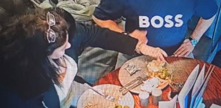 WATCH, UK woman, caught on camera, putting hair in food, get free meal