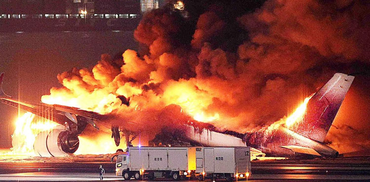 Japan probes plane inferno after 'miracle' escape