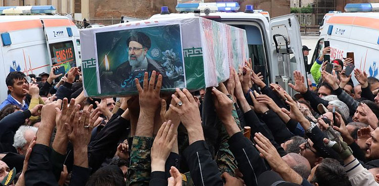 Tens of thousands gather for Ebrahim Raisi funeral procession in Tehran