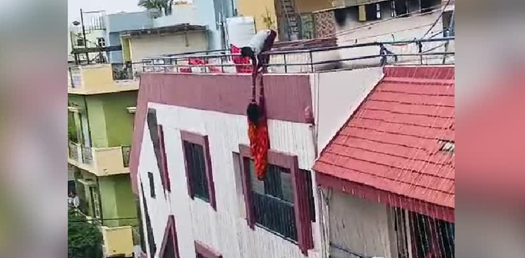 WATCH, Woman, accidentally falls, three-storey building