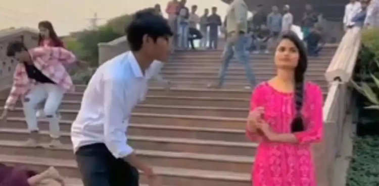 Viral video, Woman falls down stairs, couple continues shooting reel
