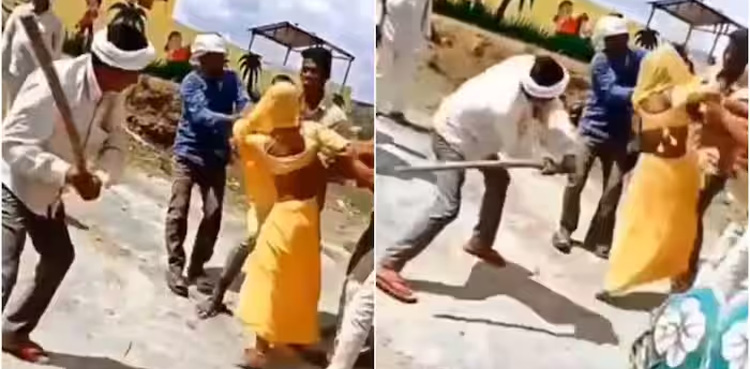 viral Video, woman publicly beaten, woman beaten with sticks,
