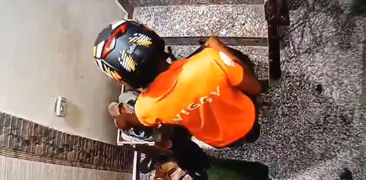 WATCH, Food delivery partner, caught, stealing shoes