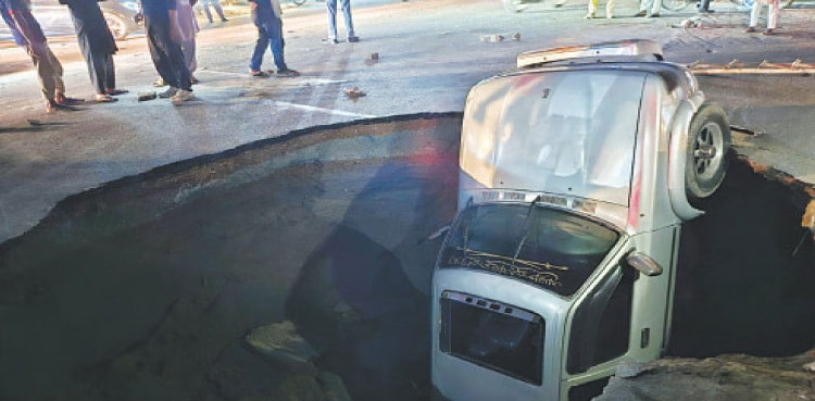 Viral video: Huge sinkhole swallows three vehicles in Lahore