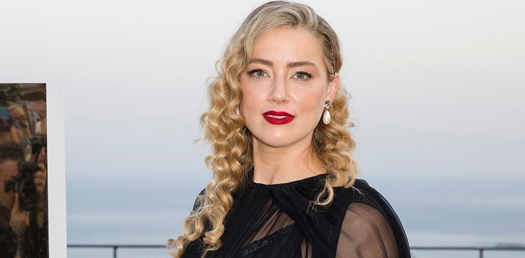 Amber Heard is expecting her second child