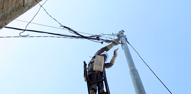 K-Electric, power theft crackdown, removes illegal connection