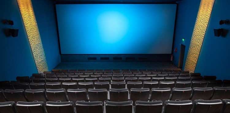 Man wins lawsuit, theater commercials