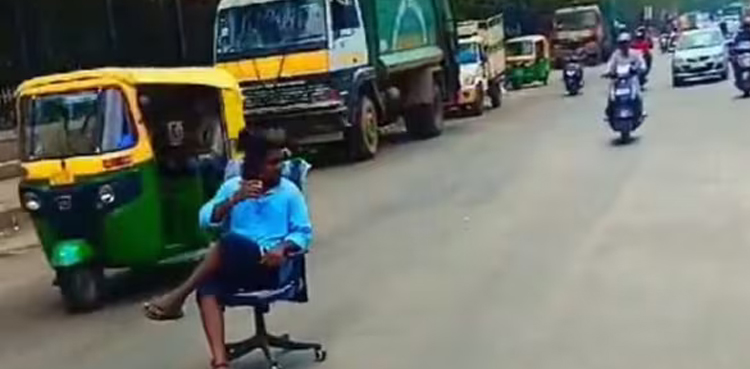Bengaluru viral video, tea-drinking stunt, man arrested Bengaluru, public safety violation