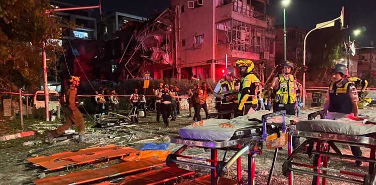 Iran launches missile barrage, Israel strikes Tehran