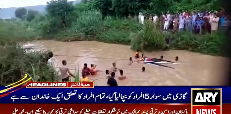 Car swept away, flood drain, Hassan Abdal