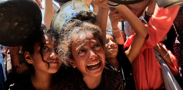 More Gazans die seeking aid and from hunger, as burial shrouds in short supply