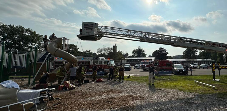 Viral, viral rescue, Connecticut playground incident, man stuck in slide, Vernon Fire Department