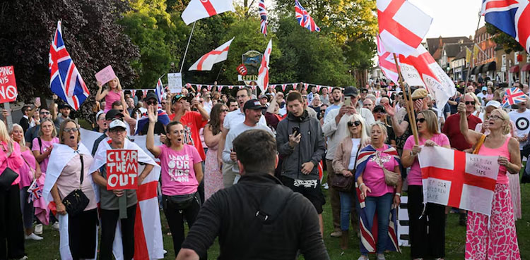 UK asylum policy, Epping Forest District Council, Bell Hotel asylum seekers, anti-immigration protests UK, Home Office asylum accommodation