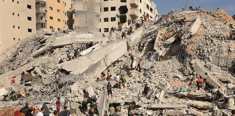 Israeli military tells Gaza City residents to leave, bombs high-rise tower
