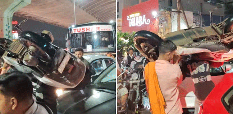 WATCH: Citizens carry scooter on shoulders to beat traffic