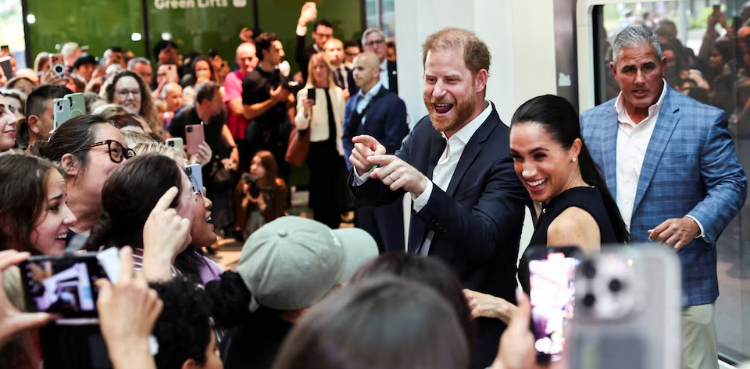 Prince Harry, Meghan arrive in Australia to a muted welcome