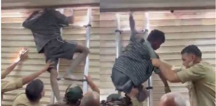 Boy gets stuck in shutter during alleged theft- VIRAL VIDEO